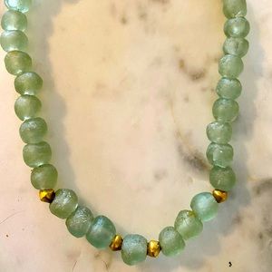 Hand carved glass necklace & gold beads